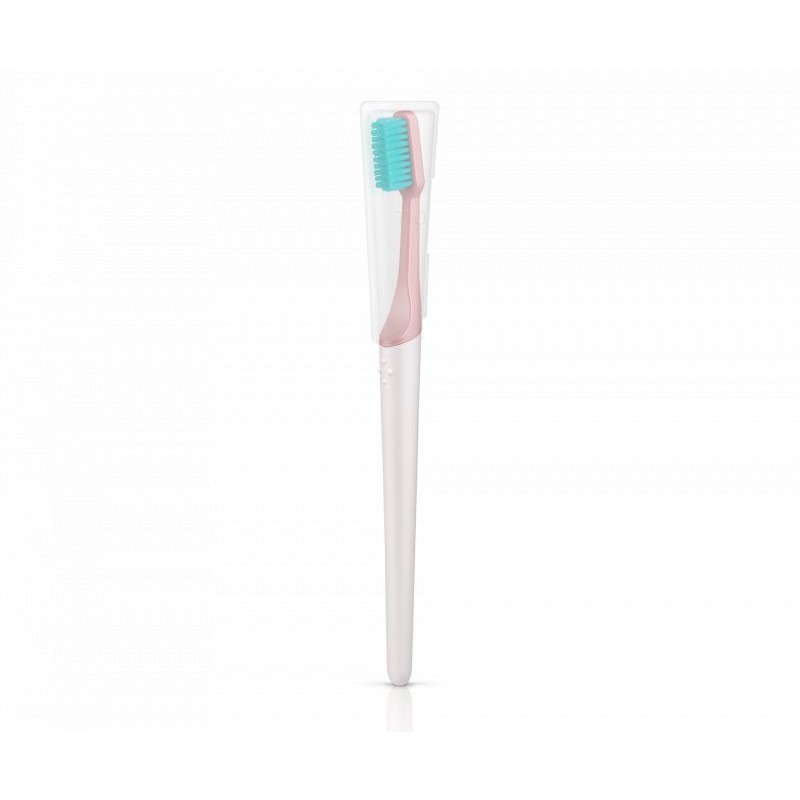 Zubní kartáček tvrdosti medium v korálově růžové barvě vyrobený z rostlin TIO